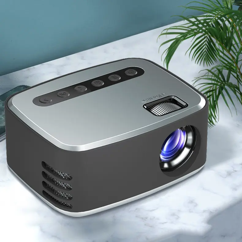 Mini projecteur de voyage compact en ABS, coloris argent ou jaune