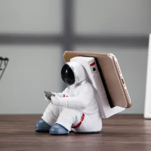 support téléphone astronaute
